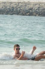 EMMA MCVEY in Bikini on the Beach in Dubai 11/01/2016