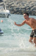 EMMA MCVEY in Bikini on the Beach in Dubai 11/01/2016