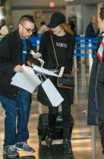 EMMA STONE at JFK Airport in Los Angeles 11/22/2016