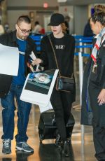 EMMA STONE at JFK Airport in Los Angeles 11/22/2016