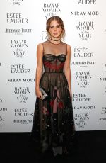 EMMA WATSON at Harper