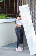 KARREUCHE TRAN Pulling a Huge Box Out of Her Car in Los Angeles 11/08/2016
