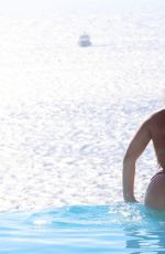 LAURYN GOODMAN in Bikini at a Pool in Mykonos 11/19/2016