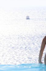 LAURYN GOODMAN in Bikini at a Pool in Mykonos 11/19/2016