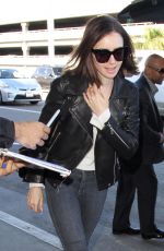 LILY COLLINS Arrives at Los Angeles International Airport 11/21/2016