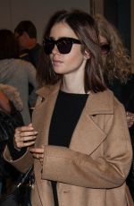 LILY COLLINS at Los Angeles International Airport 10/31/2016