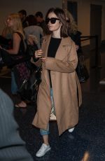 LILY COLLINS at Los Angeles International Airport 10/31/2016