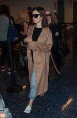 LILY COLLINS at Los Angeles International Airport 10/31/2016