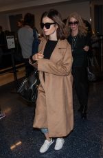 LILY COLLINS at Los Angeles International Airport 10/31/2016