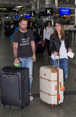 MARIA MENOUNOS at Tullamarine Airport in Melbourne 11/02/2016