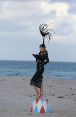 NATASHA POLY in Vinyl Outfit at a Photoshoot in Miami Beach 11/03/2016