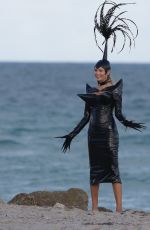 NATASHA POLY in Vinyl Outfit at a Photoshoot in Miami Beach 11/03/2016