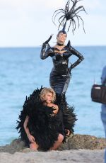 NATASHA POLY in Vinyl Outfit at a Photoshoot in Miami Beach 11/03/2016