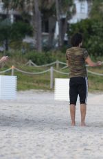 NATASHA POLY in Vinyl Outfit at a Photoshoot in Miami Beach 11/03/2016