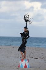 NATASHA POLY in Vinyl Outfit at a Photoshoot in Miami Beach 11/03/2016