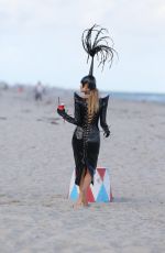 NATASHA POLY in Vinyl Outfit at a Photoshoot in Miami Beach 11/03/2016