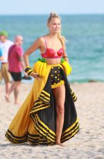NATASHA POLY on the Set of a Photoshoot on the Beach in Miami 11/03/2016
