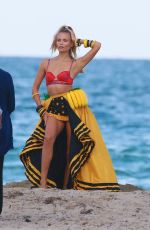 NATASHA POLY on the Set of a Photoshoot on the Beach in Miami 11/03/2016