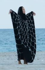 NATASHA POLY on the Set of a Photoshoota at a Beach in Miami 11/06/2016