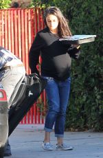 Pregnant MILA KUNIS Arrives at Her Home in Studio City 11/23/2016