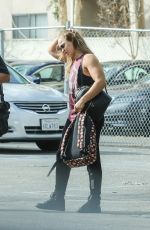 RONDA ROUSEY Arrives for Photoshoot After Confirming UFC 207 