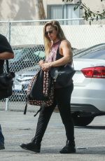RONDA ROUSEY Arrives for Photoshoot After Confirming UFC 207 