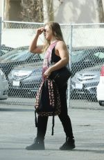 RONDA ROUSEY Arrives for Photoshoot After Confirming UFC 207 
