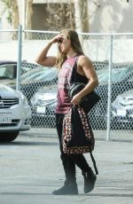 RONDA ROUSEY Arrives for Photoshoot After Confirming UFC 207 