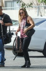 RONDA ROUSEY Arrives for Photoshoot After Confirming UFC 207 