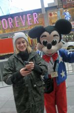 ASHLEY ROBERTS at Times Square in New York 12/08/2016