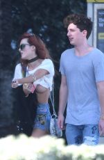 BELLA THORNE in Jeans Shorts Out on the Beach in Miami 12/18/2016