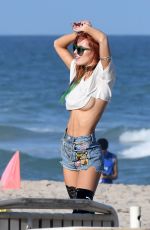 BELLA THORNE in Jeans Shorts Out on the Beach in Miami 12/18/2016