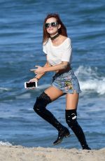 BELLA THORNE in Jeans Shorts Out on the Beach in Miami 12/18/2016