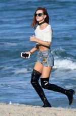 BELLA THORNE in Jeans Shorts Out on the Beach in Miami 12/18/2016