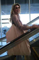 BRANDI GLANVILLE at LAX Airport in Los Angeles 12/29/2016