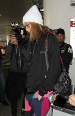 CARA DELEVINGNE at LAX Airport in Los Angeles 12/12/2016