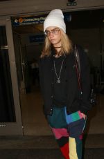 CARA DELEVINGNE at LAX Airport in Los Angeles 12/12/2016