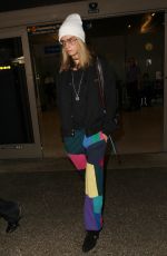 CARA DELEVINGNE at LAX Airport in Los Angeles 12/12/2016
