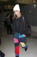 CARA DELEVINGNE at LAX Airport in Los Angeles 12/12/2016