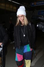 CARA DELEVINGNE at LAX Airport in Los Angeles 12/12/2016