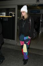 CARA DELEVINGNE at LAX Airport in Los Angeles 12/12/2016