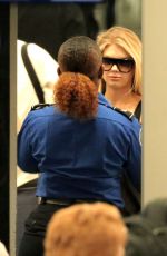 CHARLOTTE MCKINNEY in Ripped Jeans at LAX Airport 12/14/2016