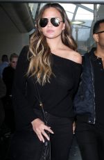 CHRISSY TEIGEN at Los Angeles International Airport 12/03/2016
