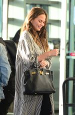 CHRISSY TEIGEN at Miami International Airport 12/27/2016