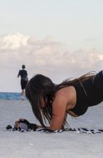 CLAUDIA ROMANI Works Out at a Beach in Miami 12/07/2016