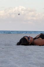 CLAUDIA ROMANI Works Out at a Beach in Miami 12/07/2016