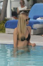 DANIELLE KNUDSON and JOCELYN CHEW at a Pool in Miami 12/03/2016