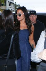 DEMI LOVATO at LAX Airport in Los Angeles 12/09/2016