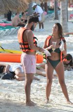 DEVIN BRUGMAN in Bikini on the Beach in Cancun 12/15/2016