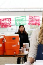 ELIZABETH OLSEN at Hope for the Holidays Celebrity Volunteer Event in Los Angeles 12/10/2016